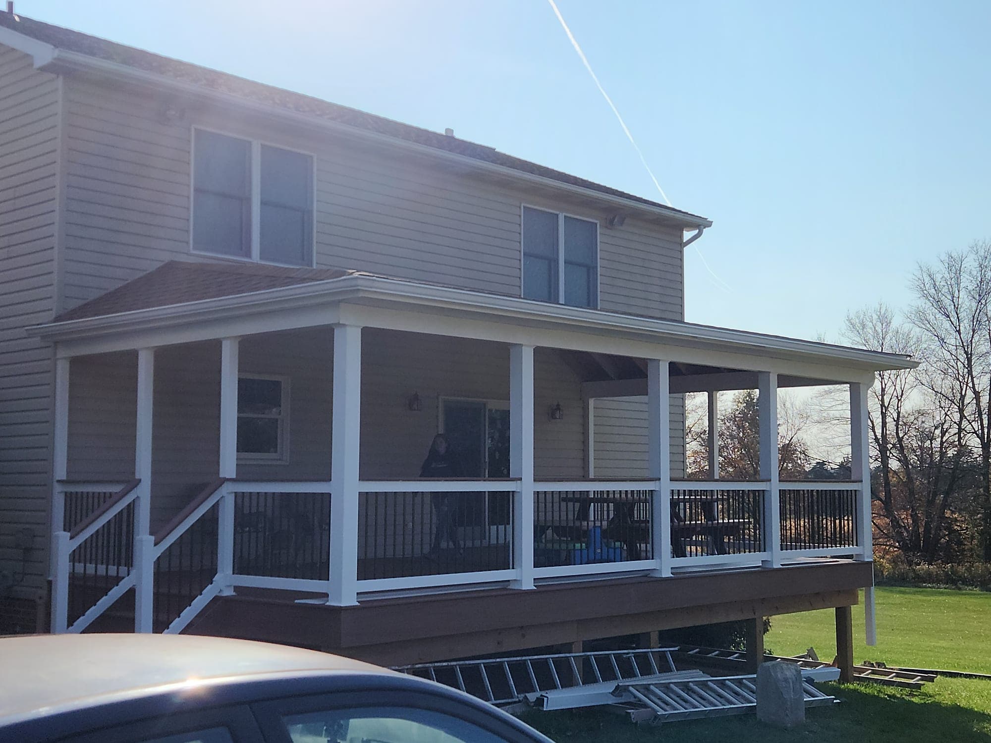 Screened-in back porch built by J.D. Rock
